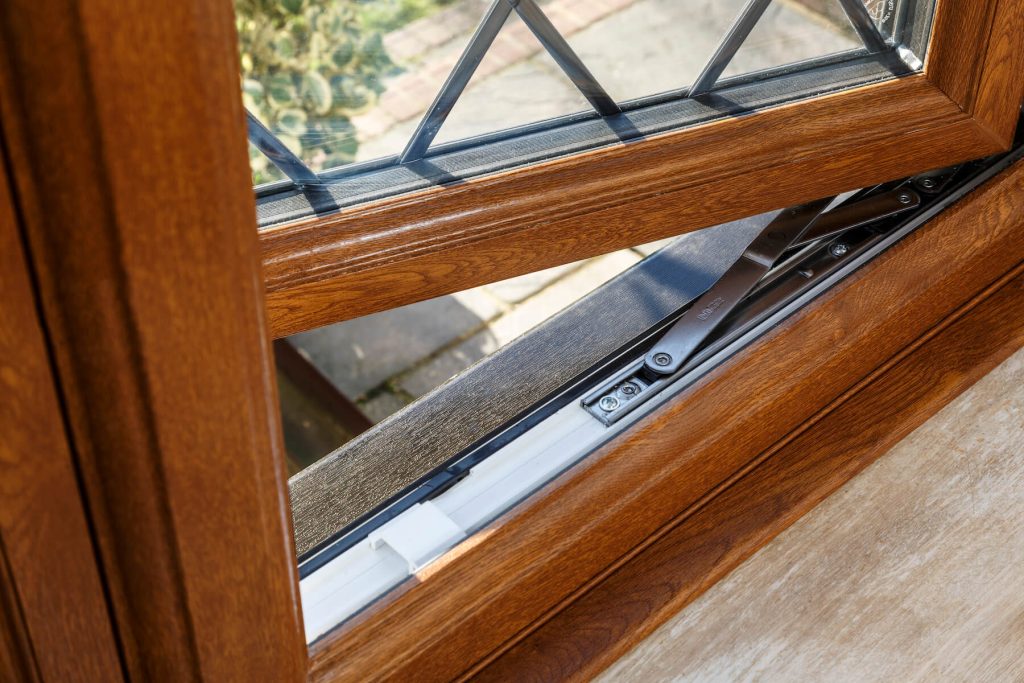 close up light brown casement window