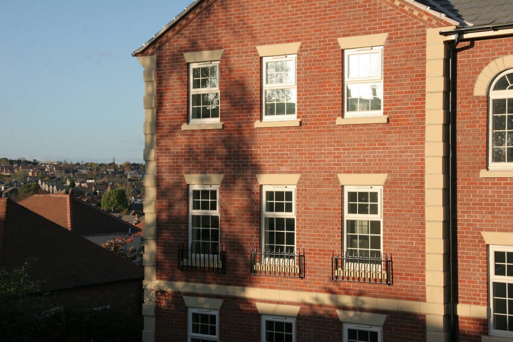 building with white casement upvc windows