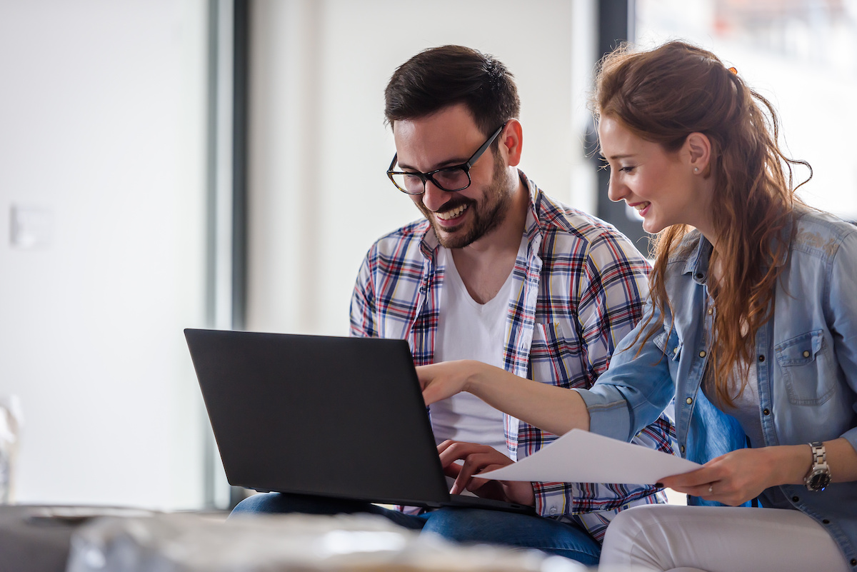 couple looking on a laptop