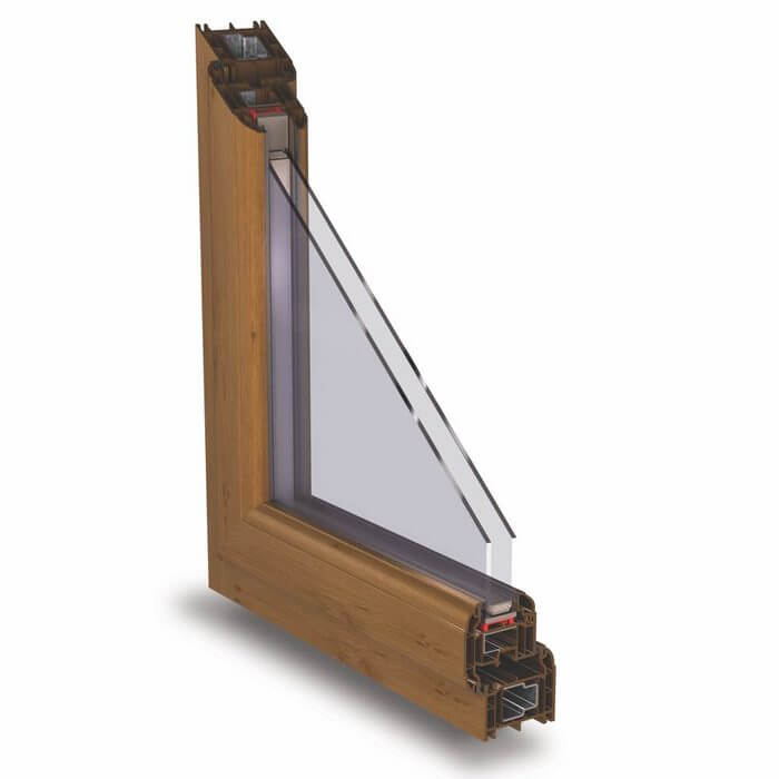 Cross-section of a Kömmerling O70 Gold casement window with Irish Oak finish and energy-efficient double seals.